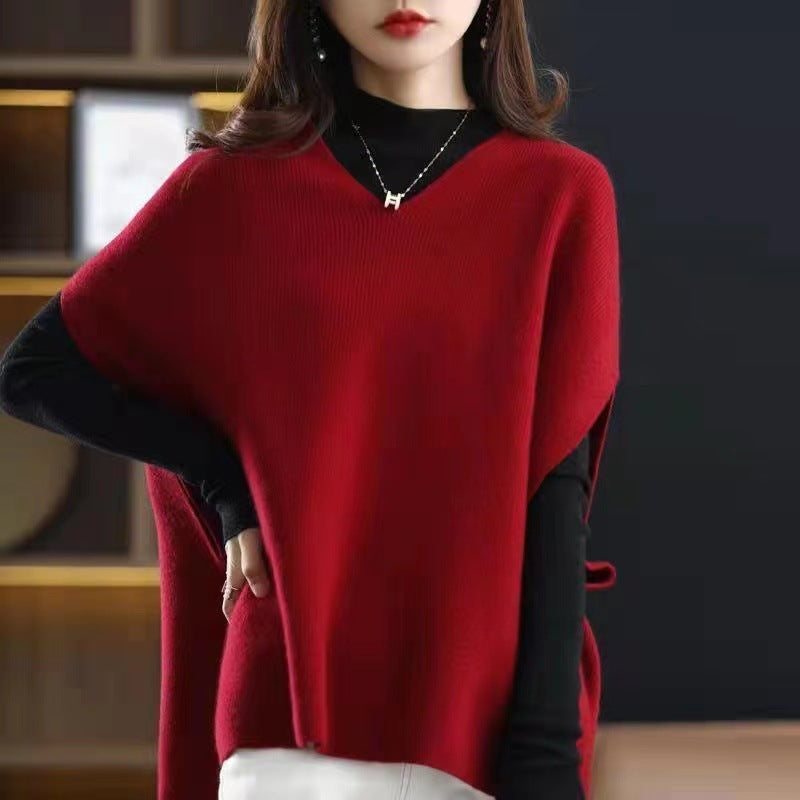 Women's knitted poncho with V-neck and elegant silhouette NOVAE