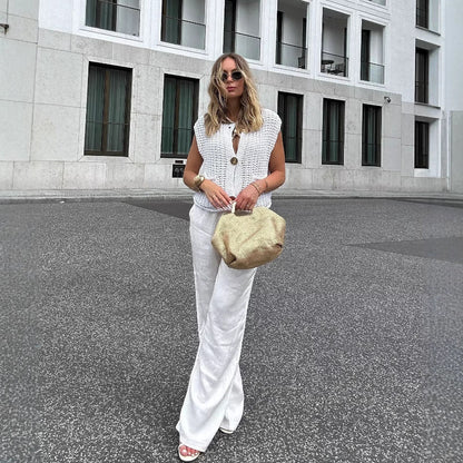 Women's knitted vest with decorative button closure NOVAE