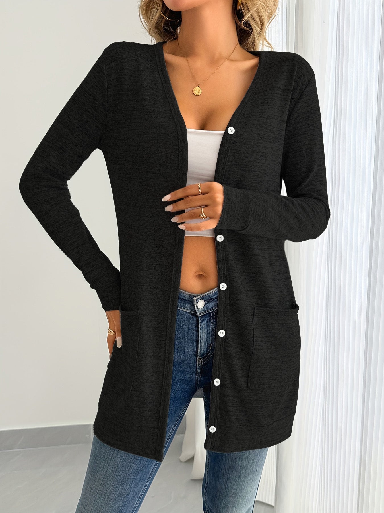 Women's long-sleeved cardigan with practical pockets and button placket NOVAE