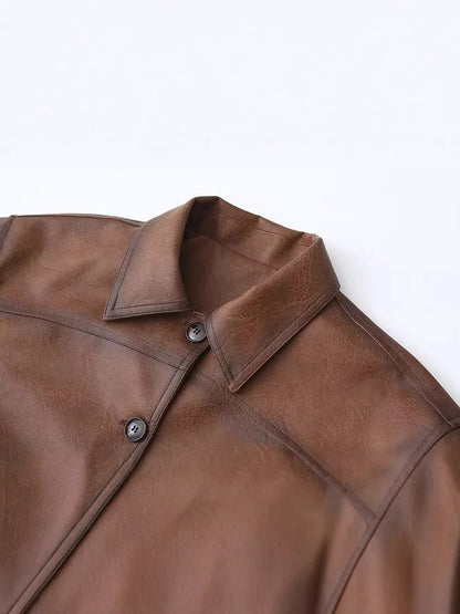 Women's cropped leather jacket with practical chest pockets and button details NOVAE