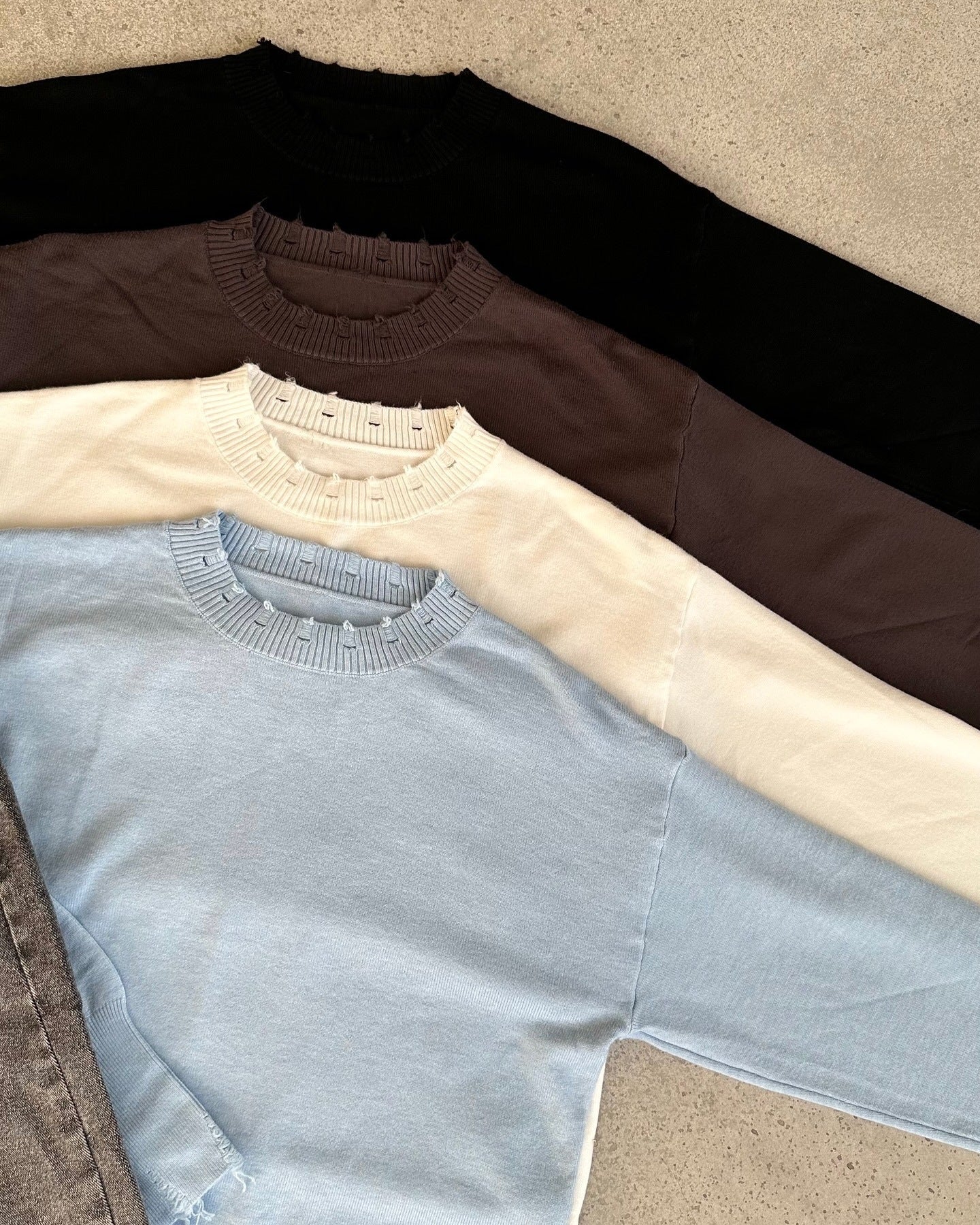 Women's casual sweater with a modern ribbed collar and trendy rip details NOVAE