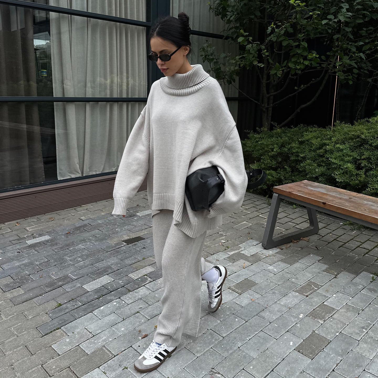 Women's comfortable knit suit with high collar and flared trousers NOVAE