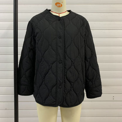 Women's quilted transitional jacket with practical pockets and round neckline NOVAE