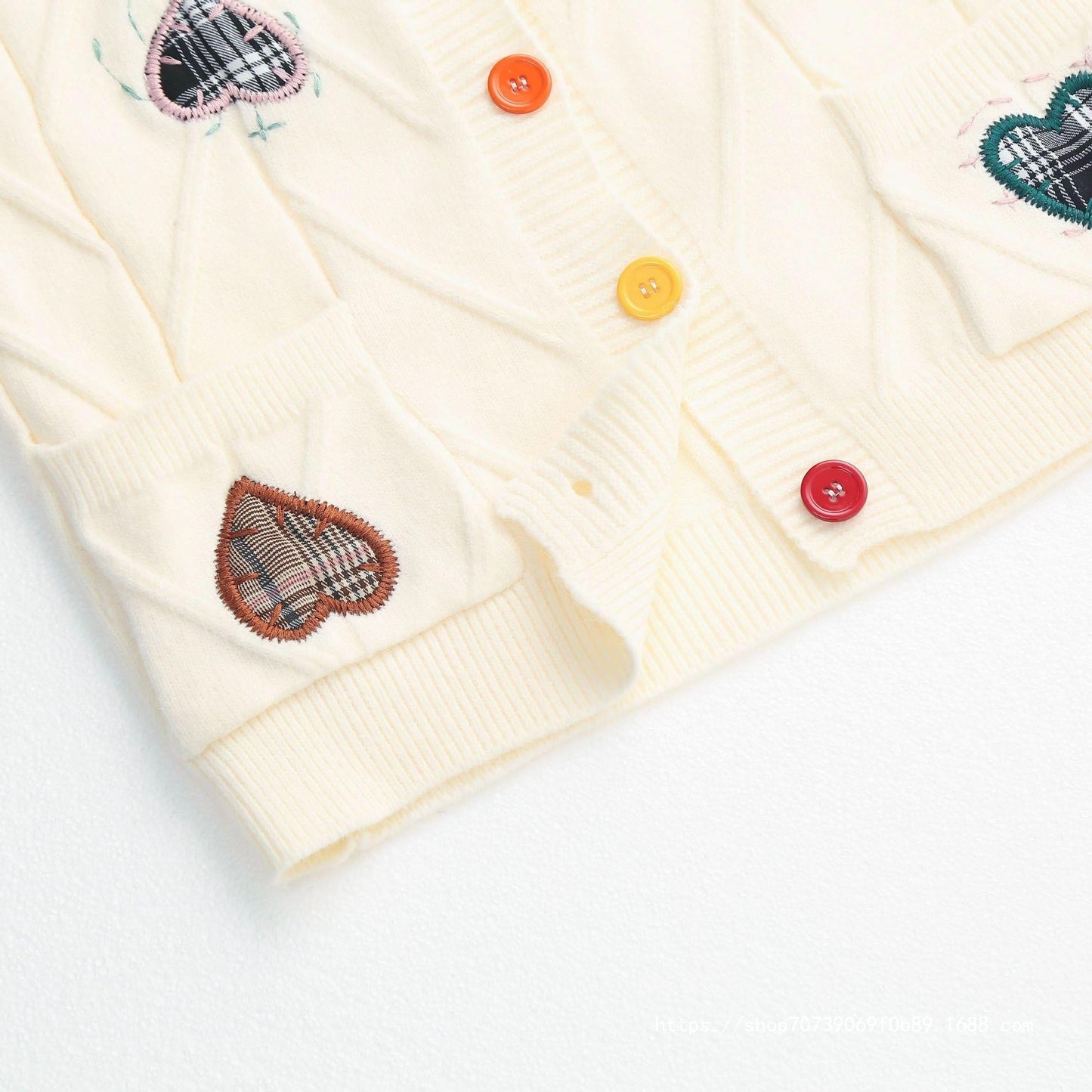 Women's cardigan with heart appliqués and button detailing NOVAE