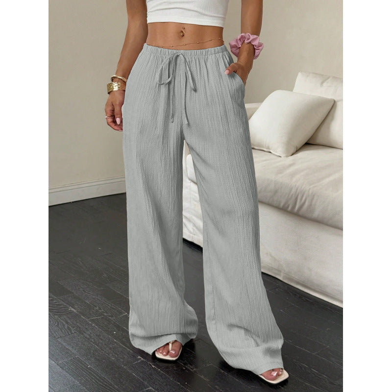 Women's casual and wide-legged leisure trousers with elasticated waistband and tie belt NOVAE