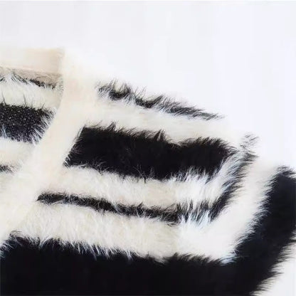 Women's cozy knit cardigan with a modern striped pattern and soft material NOVAE