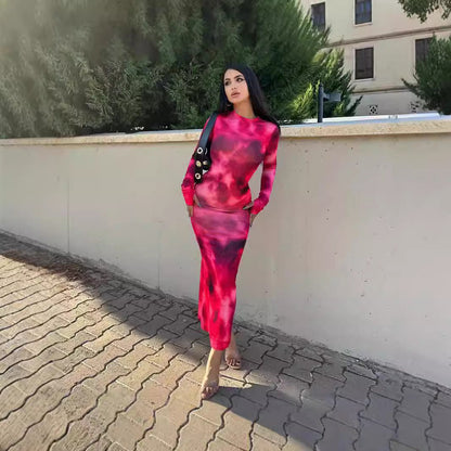 Women's figure-hugging maxi dress with long sleeves and a modern batik pattern NOVAE