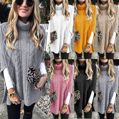 Women's knitted poncho with high collar and decorative cable pattern NOVAE