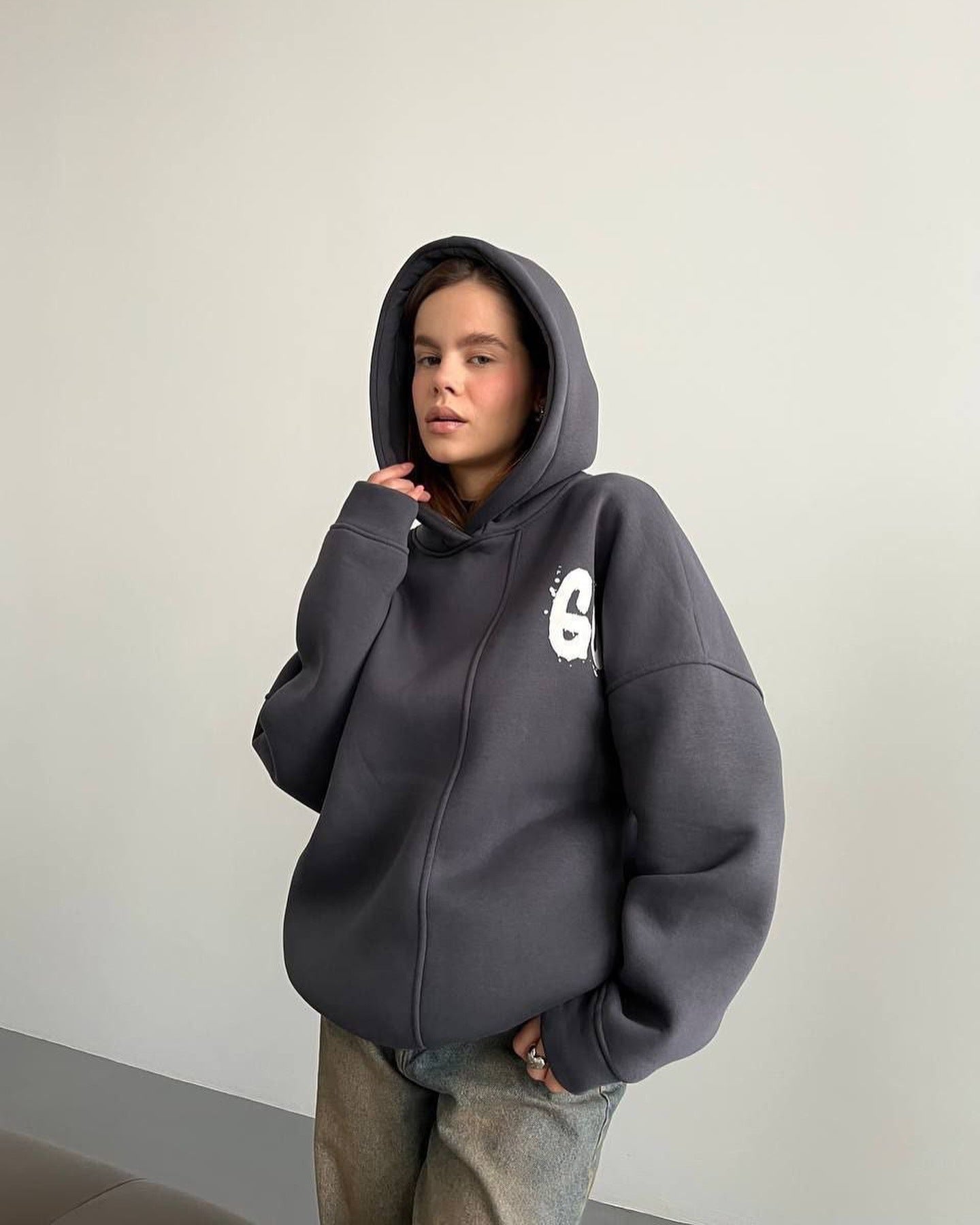 Women's oversized hoodie with a comfortable cut and casual sleeves NOVAE