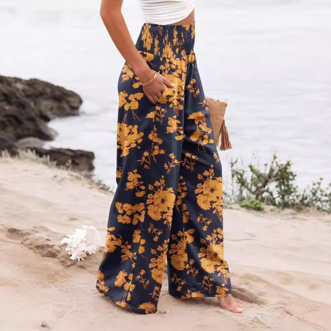 Women's palazzo trousers with elasticated waistband and floral pattern NOVAE