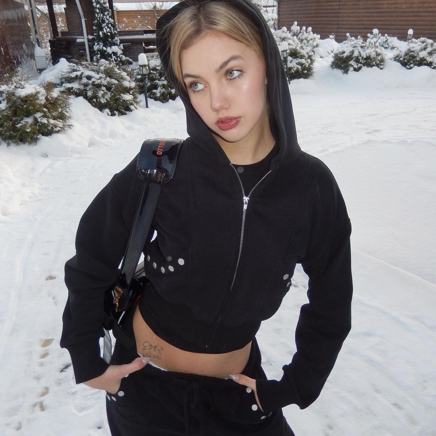 Women's sporty cropped hoodie with innovative snap button details NOVAE