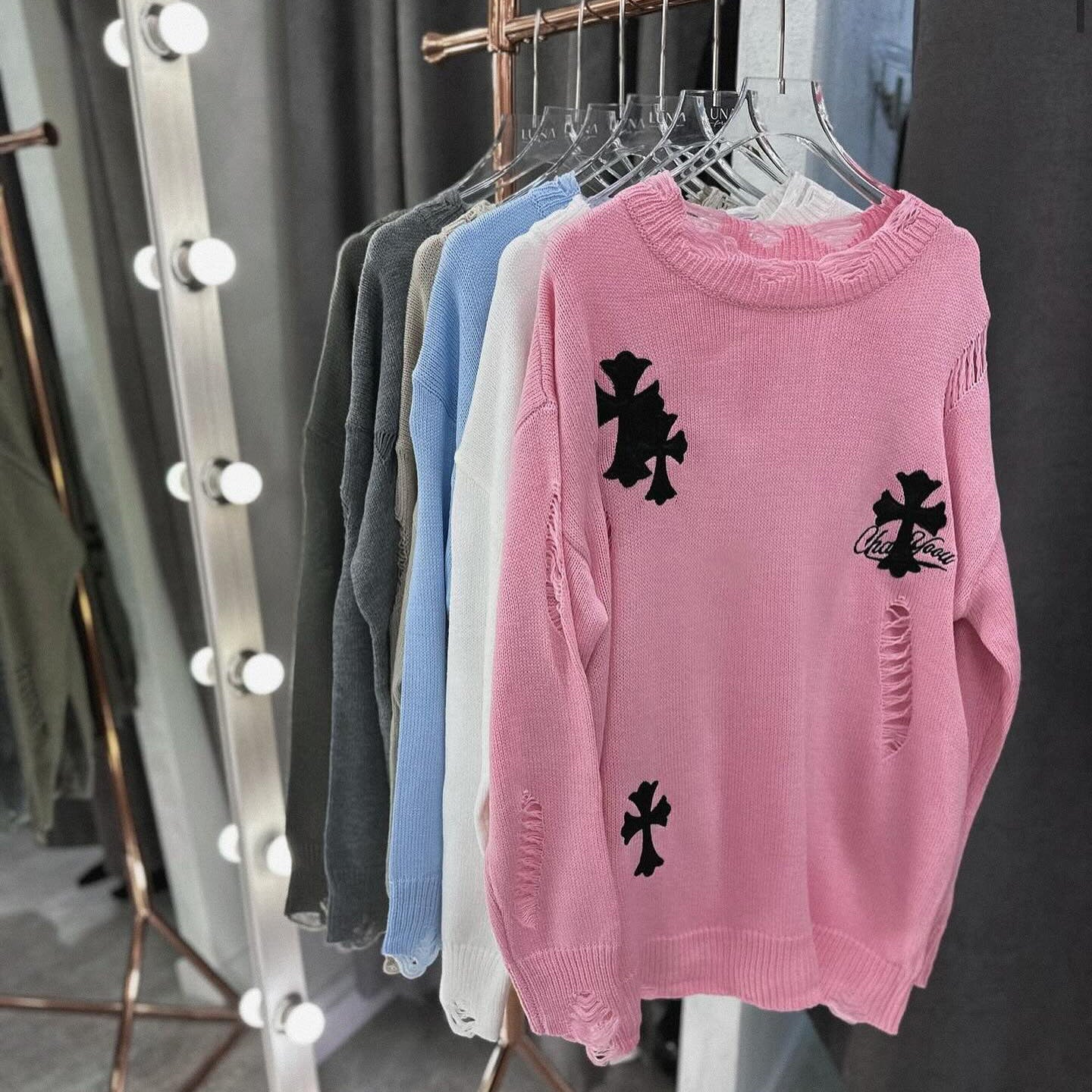 Women's casual sweater with a creative cut and frayed details NOVAE