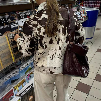 Women's denim jacket in a casual cow print with textured accents NOVAE