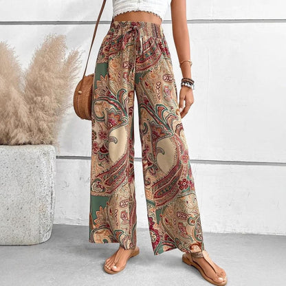 Women's wide-leg palazzo trousers with floral paisley pattern and elasticated waistband NOVAE