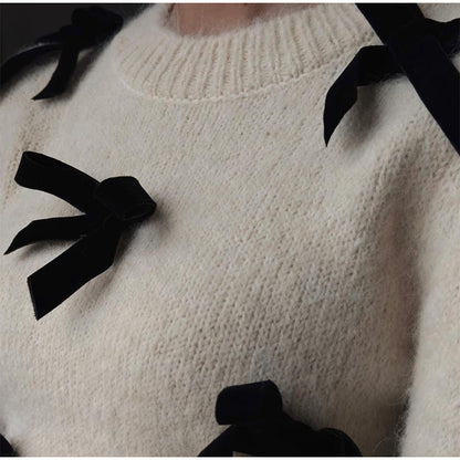 Women's knitted sweater with decorative bows NOVAE