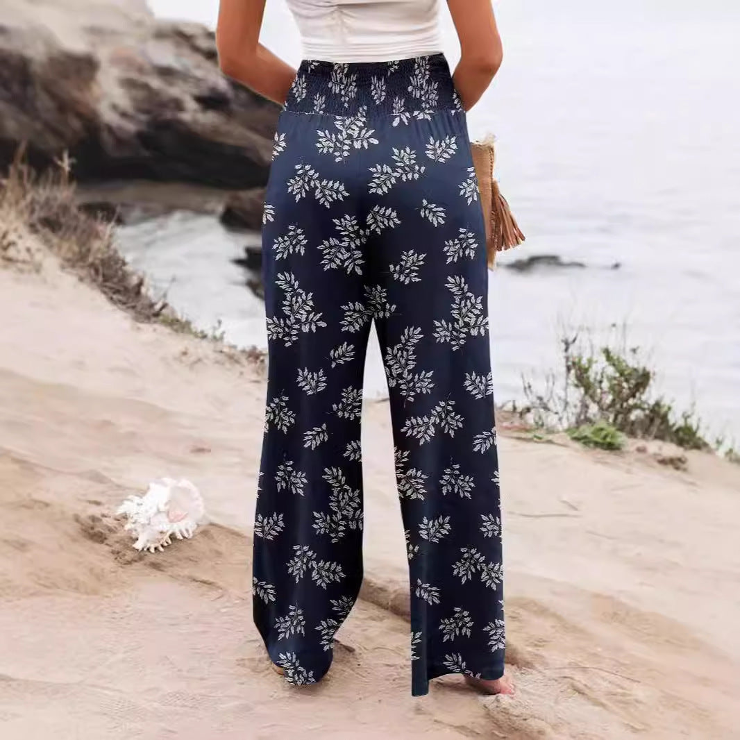 Women's palazzo trousers with elasticated waistband and floral pattern NOVAE