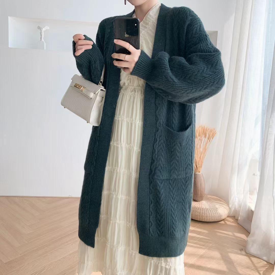 Women's chunky knit cardigan with deep pockets and elegant cable design NOVAE