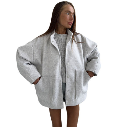 Women's oversized wool jacket with simple button details and practical pockets NOVAE