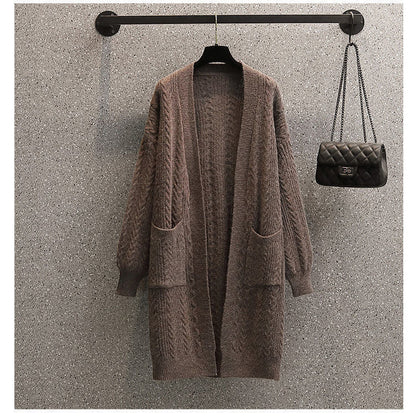 Women's chunky knit cardigan with deep pockets and elegant cable design NOVAE