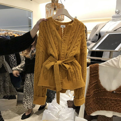 Women's cardigan with waist belt and cable knit pattern NOVAE