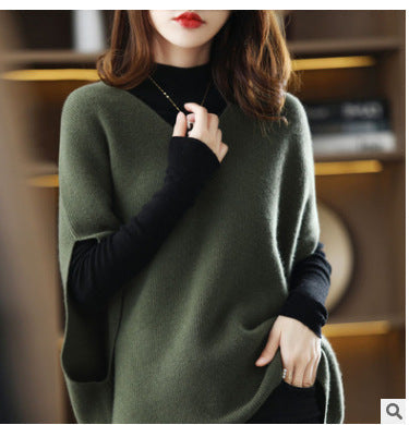 Women's knitted poncho with V-neck and elegant silhouette NOVAE