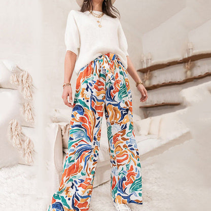 Women's wide-leg palazzo pants with colorful pattern and elastic waistband NOVAE