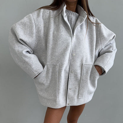 Women's oversized wool jacket with simple button details and practical pockets NOVAE