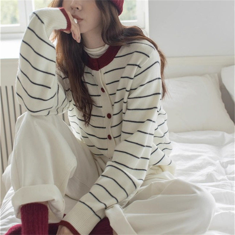 Women's cozy knit cardigan with a youthful striped pattern and practical button closure NOVAE