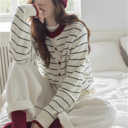 Women's cozy knit cardigan with a youthful striped pattern and practical button closure NOVAE