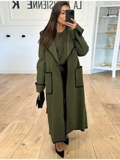 Women's elegant long coat with tie belt and contrasting piping NOVAE