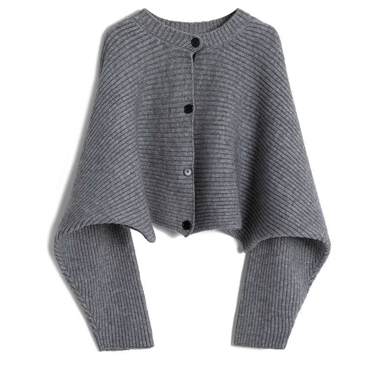 Women's fashionable knitted throw with button detail and structured design NOVAE