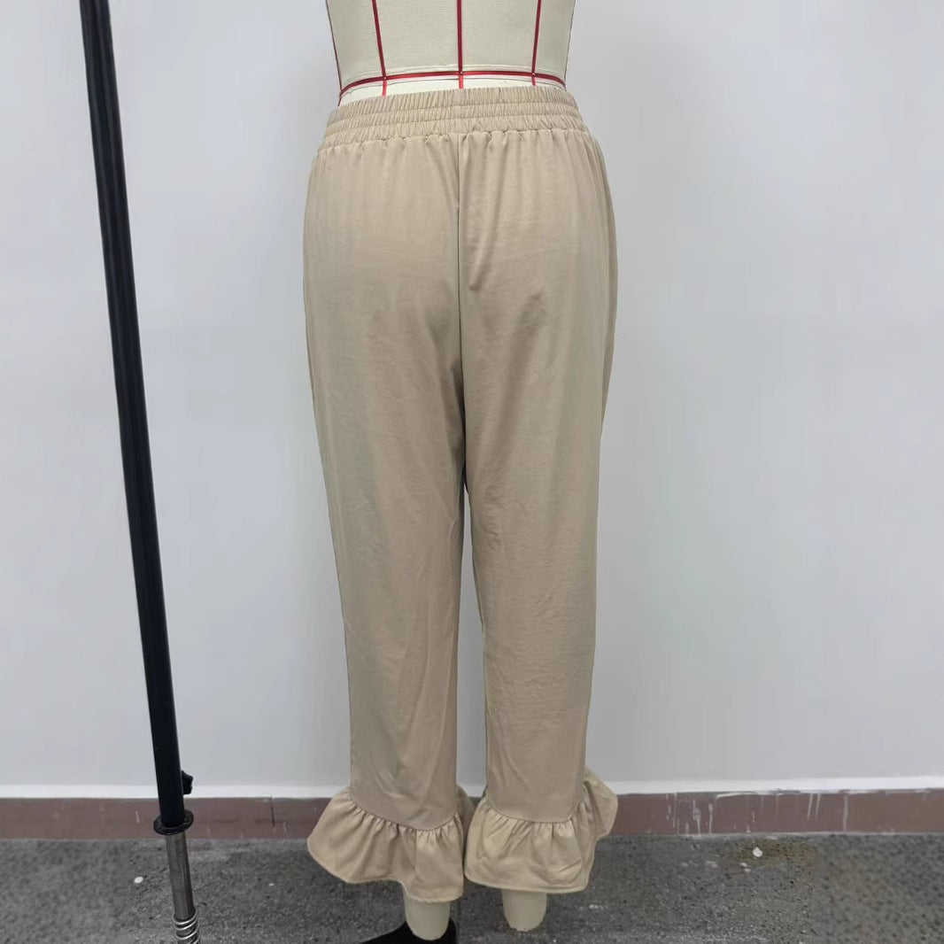 Women's casual trousers with ruffled trim NOVAE