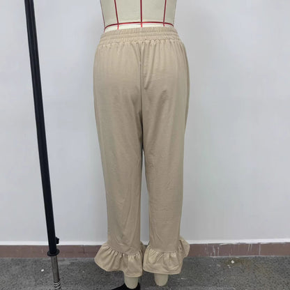 Women's casual trousers with ruffled trim NOVAE