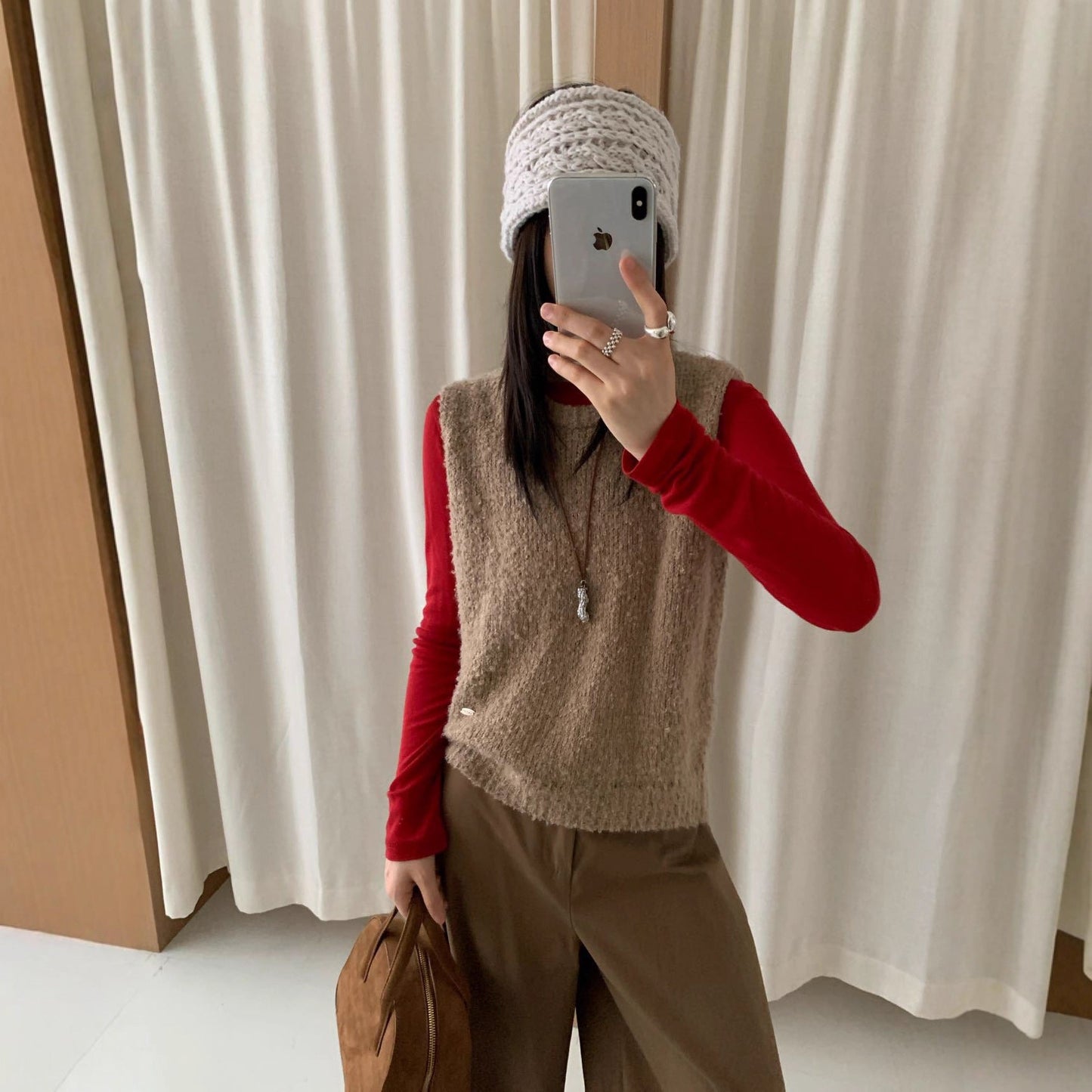 Women's knitted vest with soft, fluffy material and modern cut NOVAE