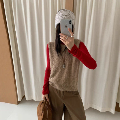 Women's knitted vest with soft, fluffy material and modern cut NOVAE