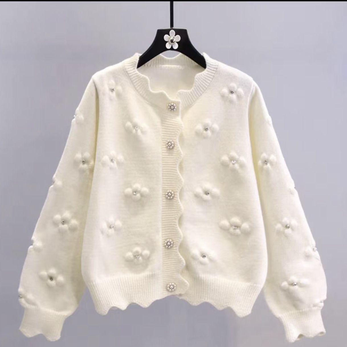 Women's playful knit cardigan with decorative pearl buttons and floral design NOVAE