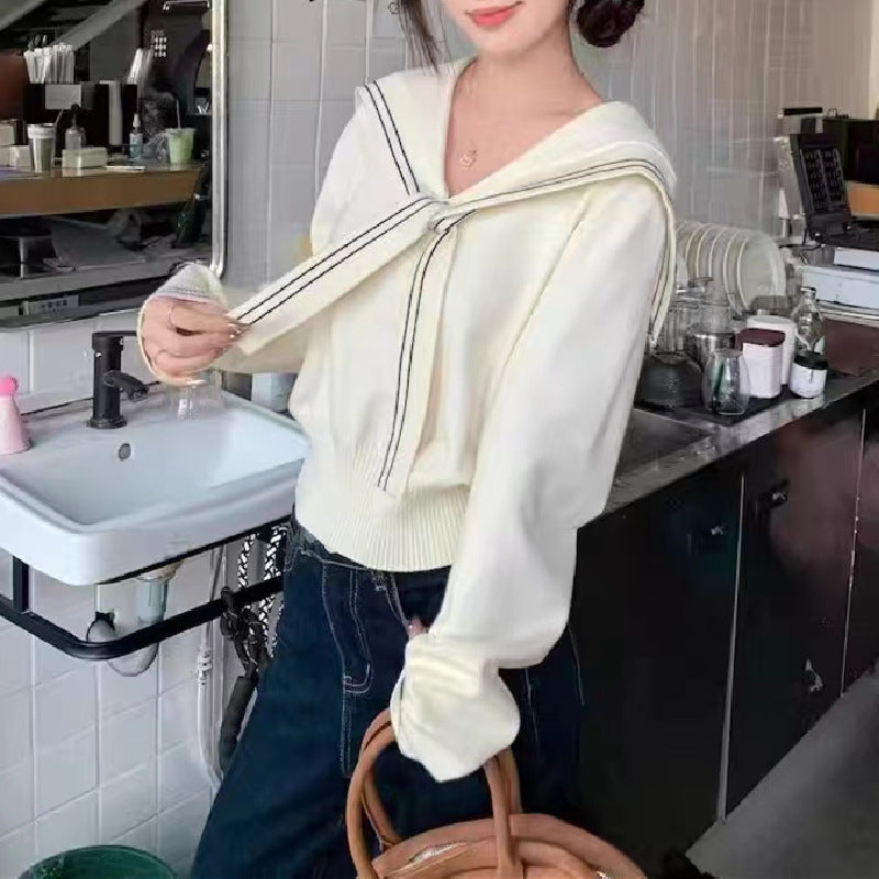 Women's stylish sweater with bow collar and fine knit structure NOVAE