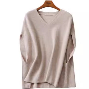 Women's knitted poncho with V-neck and elegant silhouette NOVAE