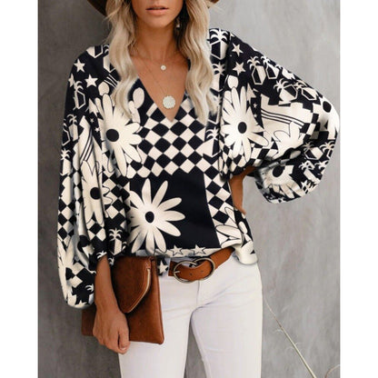 Women's blouse with wide puff sleeves and elegant V-neck NOVAE