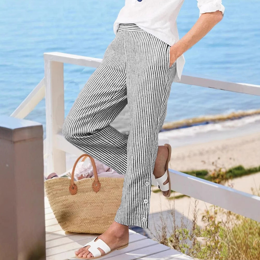 Women's striped long trousers with button details and side pockets NOVAE