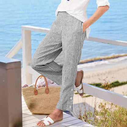 Women's striped long trousers with button details and side pockets NOVAE