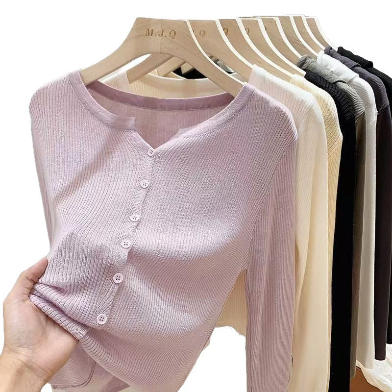 Women's figure-hugging cardigan with elegant button closure and fine ribbed texture NOVAE