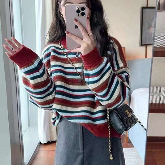 Women's striped sweater with a loose fit and fashionable details NOVAE