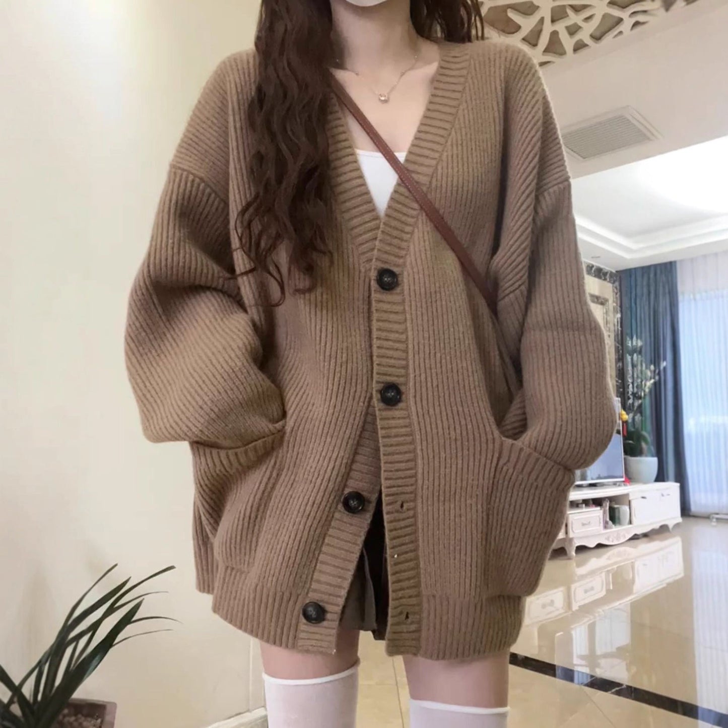 Women's chunky knit cardigan with large pockets and button details NOVAE