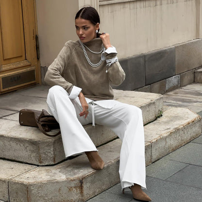 Women's cozy knit sweater with high collar and stylish cuffs NOVAE