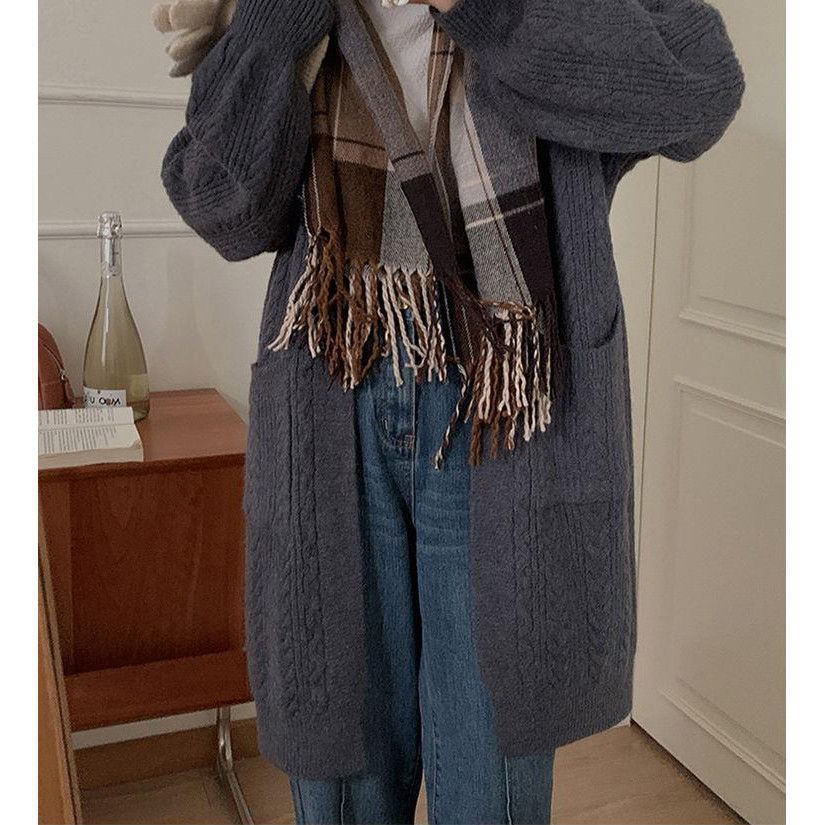 Women's chunky knit cardigan with deep pockets and elegant cable design NOVAE