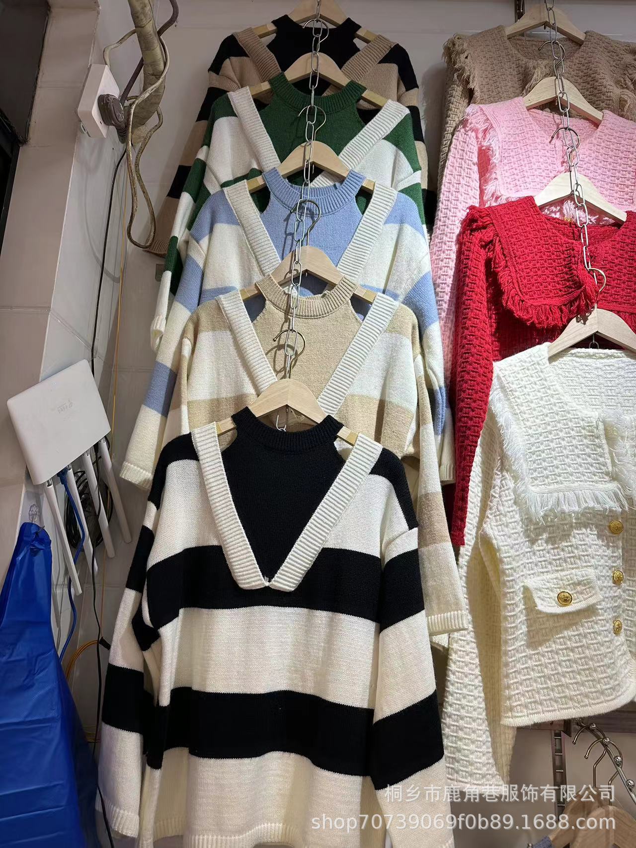 Women's V-neck oversized sweater with fashionable striped pattern and open shoulder design NOVAE
