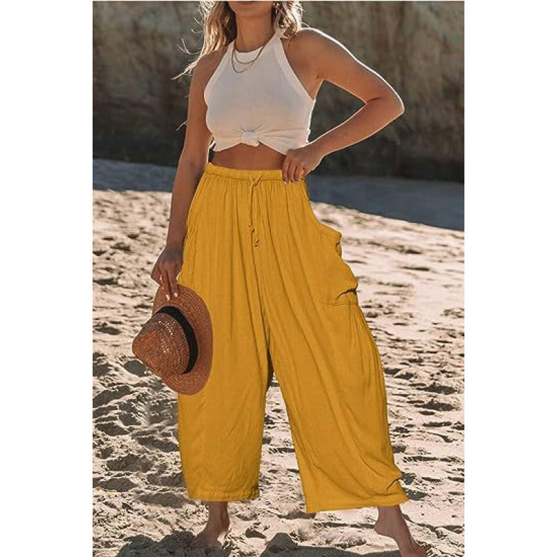 Women's wide and comfortable summer trousers with elasticated waistband and practical pockets NOVAE