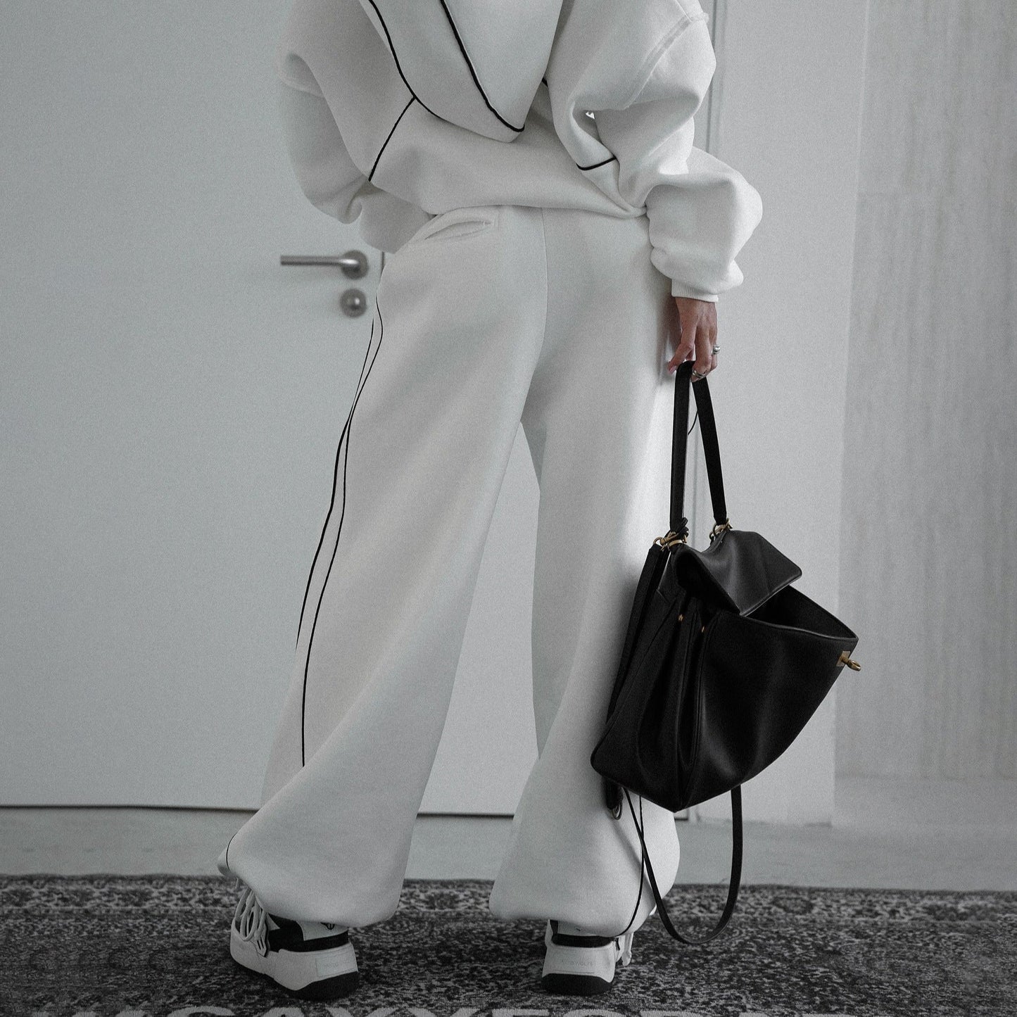 Women's hooded jacket with modern contrast stitching and kangaroo pocket NOVAE