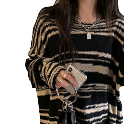 Women's knitted sweater with an elegant striped pattern and a relaxed fit NOVAE